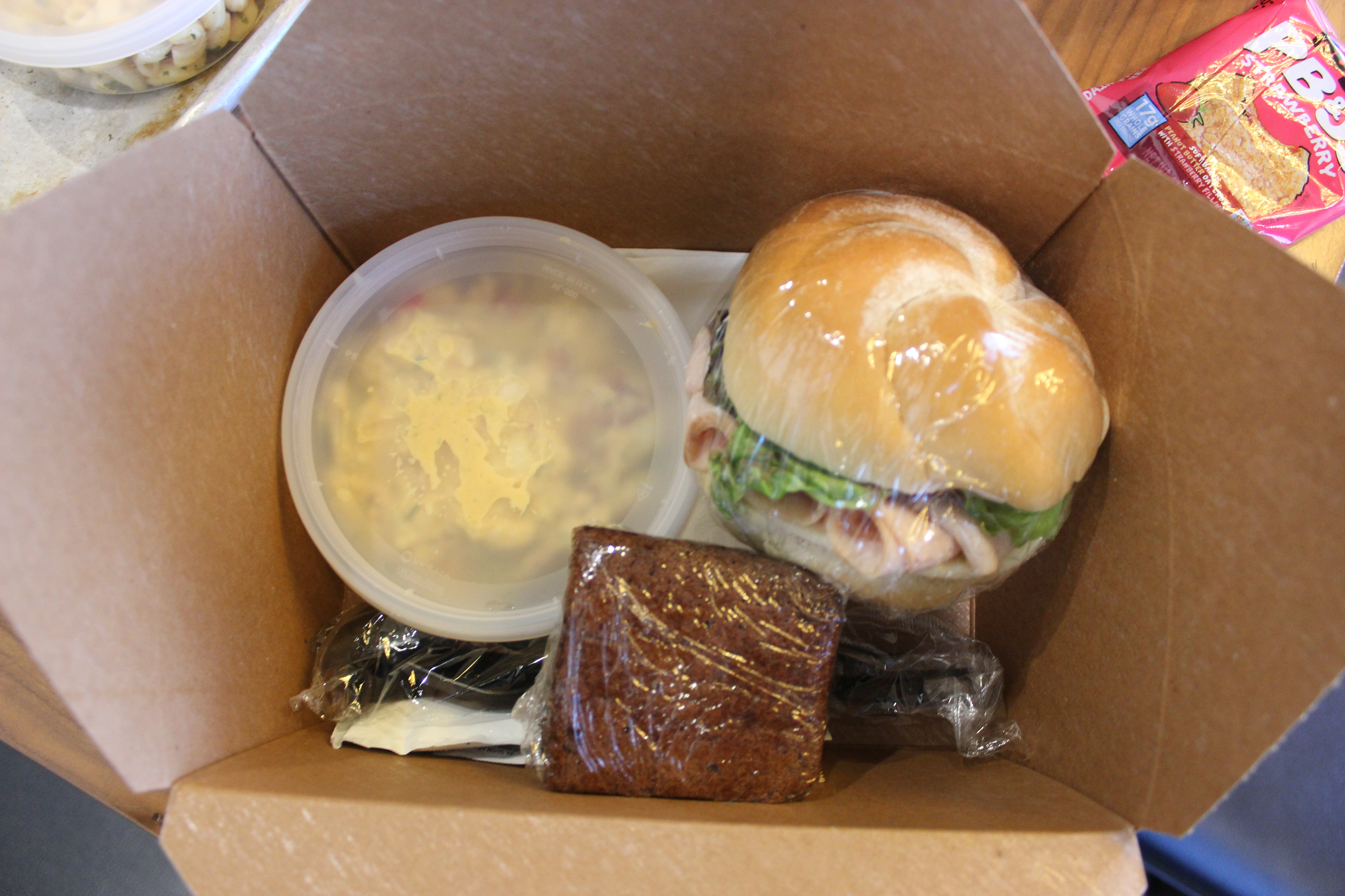 Turkey Sandwich on Kaiser Roll with Potato Salad and Brownie.