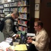 Chris helps an airmen get his very own Metropolitan Library System Card. 