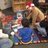 Children enjoying a reading break during the Holiday Open House. 