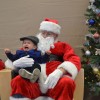 Someone isn't so excited to see Santa.