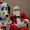 Spoticus & Santa about to go over the library's naughty and nice list. 